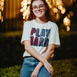 smiling woman at night