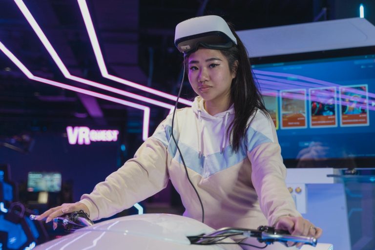 a woman playing virtual reality glasses